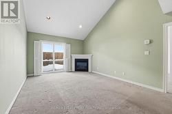 Living Room with Vaulted Ceiling - 