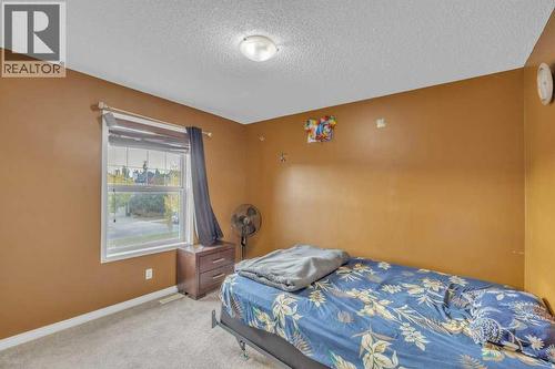 550 Copperfield Boulevard Se, Calgary, AB - Indoor Photo Showing Bedroom