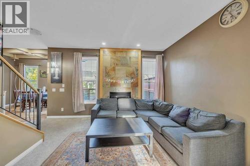 550 Copperfield Boulevard Se, Calgary, AB - Indoor Photo Showing Living Room
