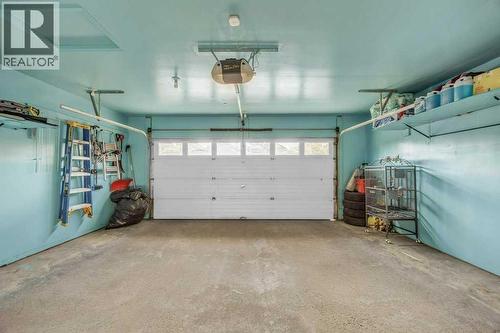 550 Copperfield Boulevard Se, Calgary, AB - Indoor Photo Showing Garage