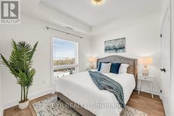 Bright Bedroom with Premium Laminate Flooring - 