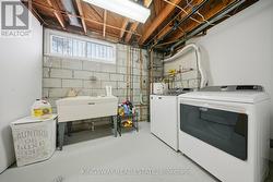 Separate Laundry Room with Sink - 