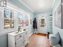 Enclosed front porch. - 