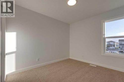 371 Fireside Drive, Cochrane, AB - Indoor Photo Showing Other Room