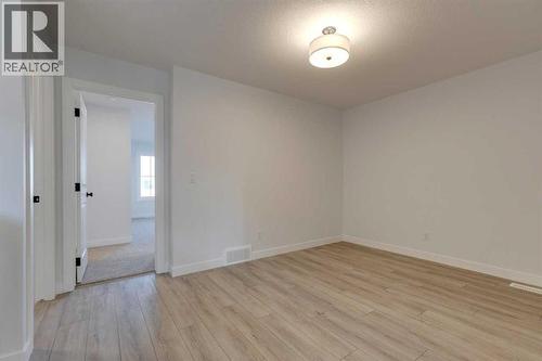 371 Fireside Drive, Cochrane, AB - Indoor Photo Showing Other Room