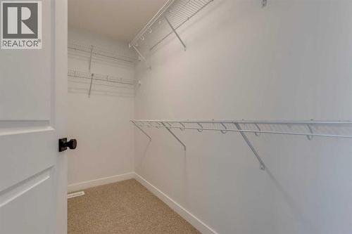 371 Fireside Drive, Cochrane, AB - Indoor With Storage