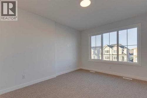 371 Fireside Drive, Cochrane, AB - Indoor Photo Showing Other Room