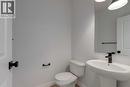 371 Fireside Drive, Cochrane, AB  - Indoor Photo Showing Bathroom 