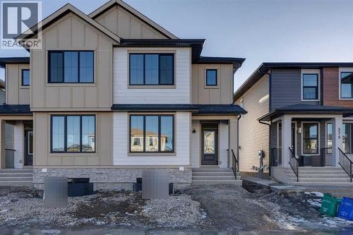 371 Fireside Drive, Cochrane, AB - Outdoor With Facade