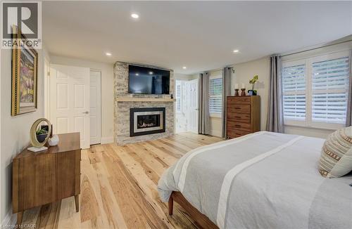 38 Academy Crescent, Waterloo, ON - Indoor Photo Showing Bedroom With Fireplace