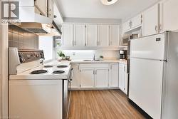 Kitchen With Access To Backyard & Garage/Driveway - 