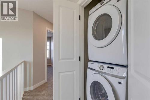 315 Fireside Drive, Cochrane, AB - Indoor Photo Showing Laundry Room