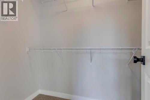 315 Fireside Drive, Cochrane, AB - Indoor With Storage