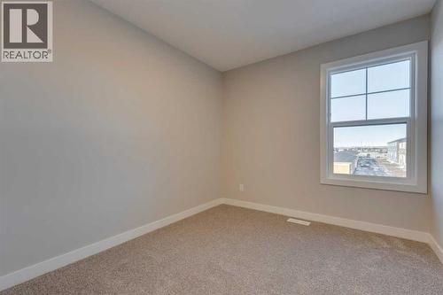 315 Fireside Drive, Cochrane, AB - Indoor Photo Showing Other Room