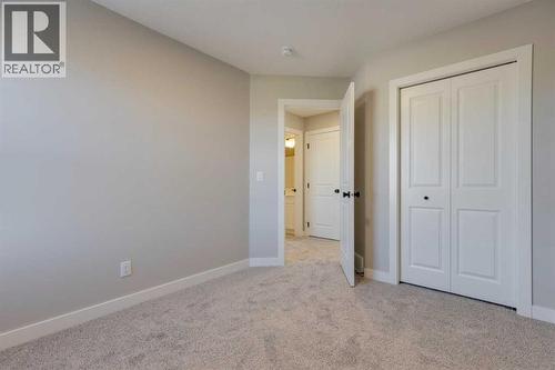 315 Fireside Drive, Cochrane, AB - Indoor Photo Showing Other Room