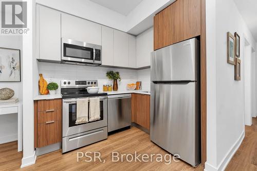 110 - 41 Danforth Road, Toronto, ON - Indoor Photo Showing Kitchen With Stainless Steel Kitchen