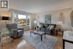 Large living room with newer windows - 