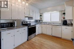 L-Shape Kitchen provides plenty of counter space you need for prepping  meals for the entire family - 