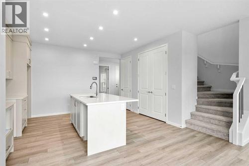 659 Buffaloberry Manor Se, Calgary, AB - Indoor Photo Showing Kitchen