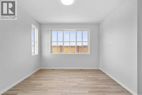 659 Buffaloberry Manor Se, Calgary, AB - Indoor Photo Showing Other Room