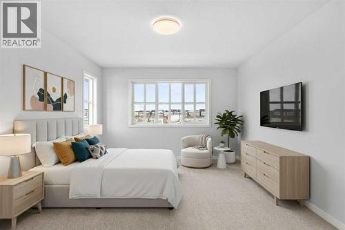 Virtually Staged - 659 Buffaloberry Manor Se, Calgary, AB - Indoor Photo Showing Bedroom