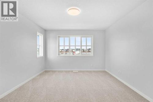 659 Buffaloberry Manor Se, Calgary, AB - Indoor Photo Showing Other Room