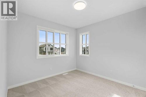 659 Buffaloberry Manor Se, Calgary, AB - Indoor Photo Showing Other Room