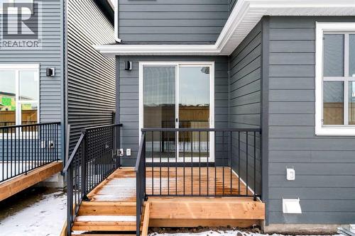 659 Buffaloberry Manor Se, Calgary, AB - Outdoor With Deck Patio Veranda With Exterior