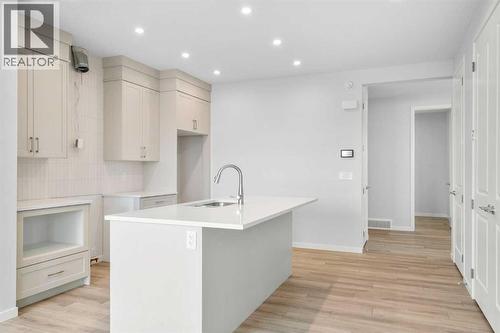 659 Buffaloberry Manor Se, Calgary, AB - Indoor Photo Showing Kitchen
