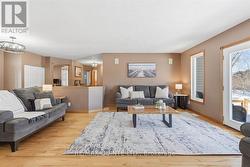 Living Rm view of Hallway, patio doors to backyard - 