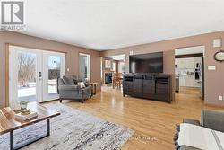 Living Rm with patio doors w/Kitchen access - 