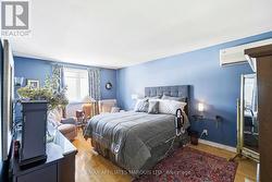 primary bedroom with walk in closet - 