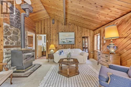 31 Desroches Trail, Tiny, ON - Indoor Photo Showing Living Room With Fireplace