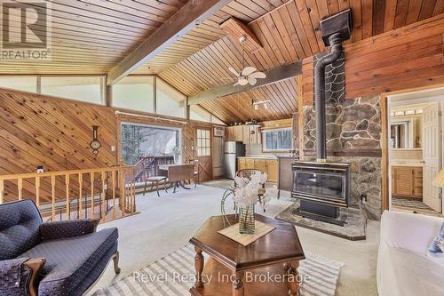 31 Desroches Trail, Tiny, ON - Indoor Photo Showing Living Room With Fireplace