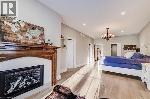 107 Earl Street, Kitchener, ON - Indoor Photo Showing Bedroom With Fireplace