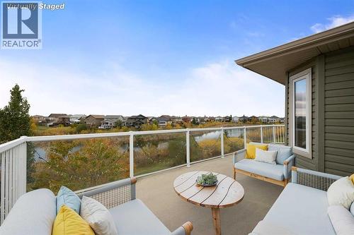 deck off primary bed virtually staged - 145 Fireweed Crescent, Fort Mcmurray, AB - Outdoor With Balcony With Deck Patio Veranda With Exterior