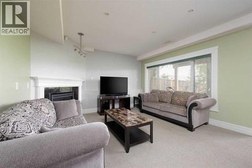 living w/gas f/p suite - 145 Fireweed Crescent, Fort Mcmurray, AB - Indoor Photo Showing Living Room With Fireplace