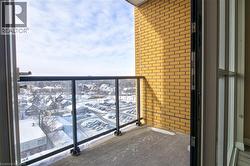 View of snow covered back of property - 