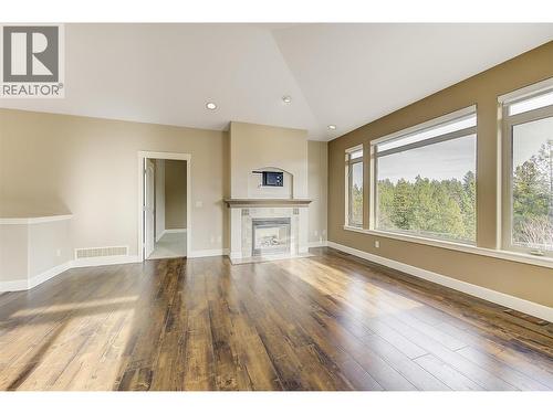 4035 Gellatly Road S Unit# 273, West Kelowna, BC - Indoor Photo Showing Other Room With Fireplace