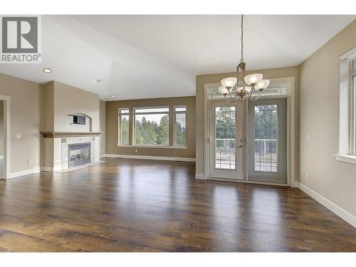 Dining Area - 4035 Gellatly Road S Unit# 273, West Kelowna, BC - Indoor Photo Showing Living Room With Fireplace