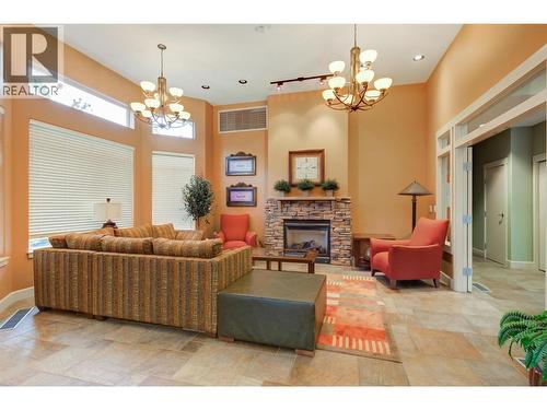 4035 Gellatly Road S Unit# 273, West Kelowna, BC - Indoor Photo Showing Living Room With Fireplace