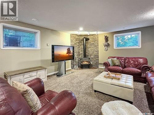 110 Sunset Crescent, Balcarres, SK - Indoor Photo Showing Living Room With Fireplace