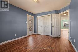 Primary Bedroom Main Floor with Door to Side Porch - 