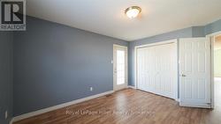 Virtually Staged Primary Bedroom Main Floor - 