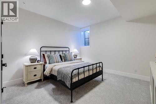 11 Normandy Lane Sw, Calgary, AB - Indoor Photo Showing Bedroom