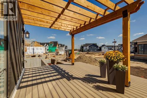 11 Normandy Lane Sw, Calgary, AB - Outdoor With Deck Patio Veranda