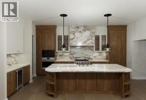 11 Normandy Lane Sw, Calgary, AB - Indoor Photo Showing Kitchen