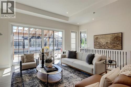 11 Normandy Lane Sw, Calgary, AB - Indoor Photo Showing Living Room