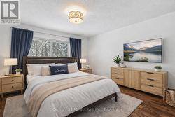 Virtually staged primary bedroom - 
