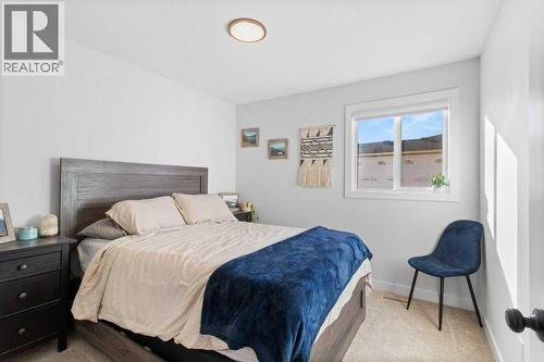 16 Trinity Street, Lacombe, AB - Indoor Photo Showing Bedroom